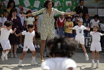 Michelle Obama Gets Physical