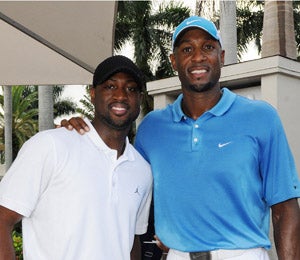 Star Gazing: D. Wade and Alonzo Mourning Tee Off