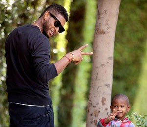 Star Gazing: Usher and Son Spread Peace and Love