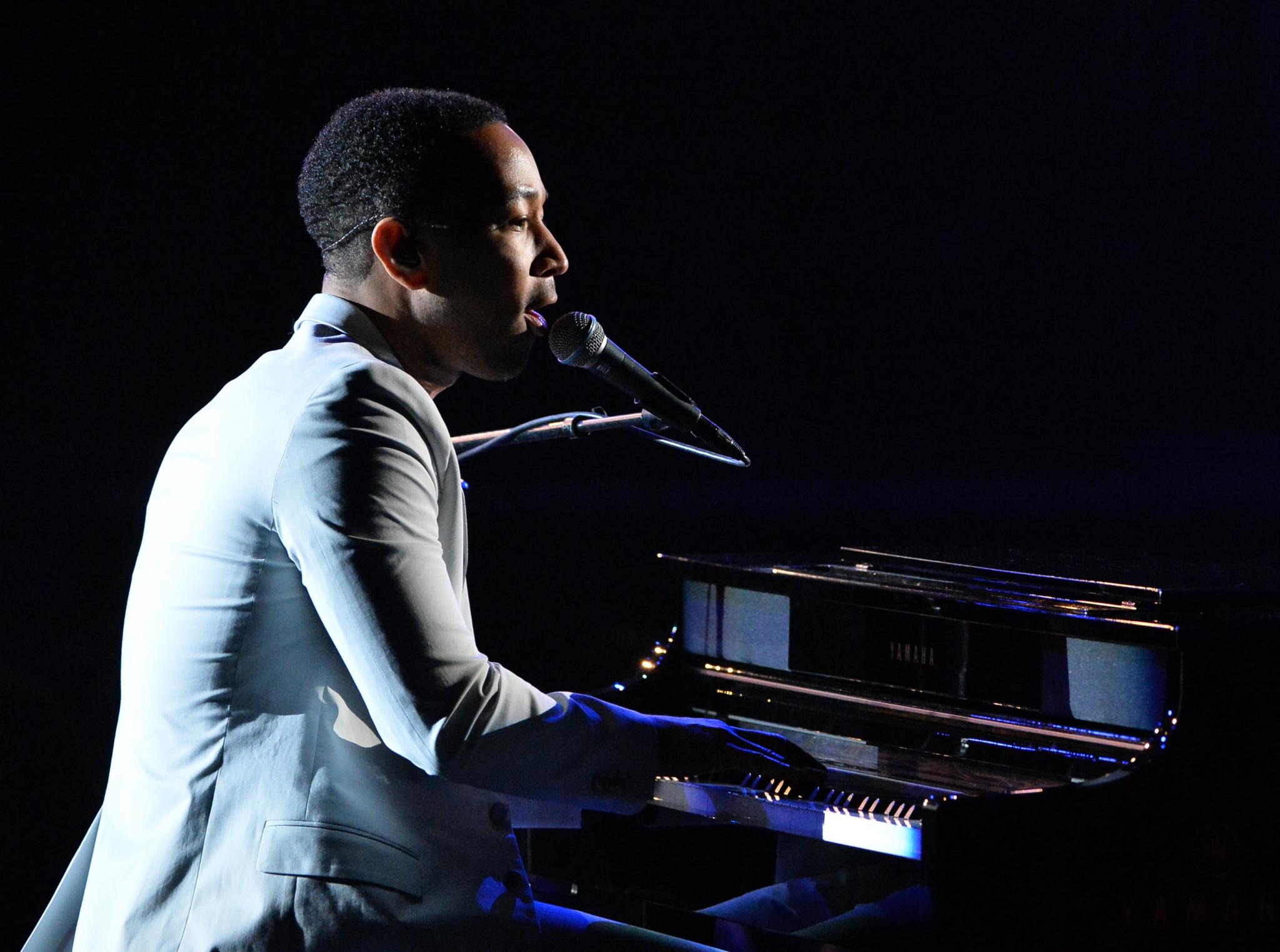 LISTEN: John Legend Confronts The Harsh Realities Of The American Dream With New Song 'In America'

