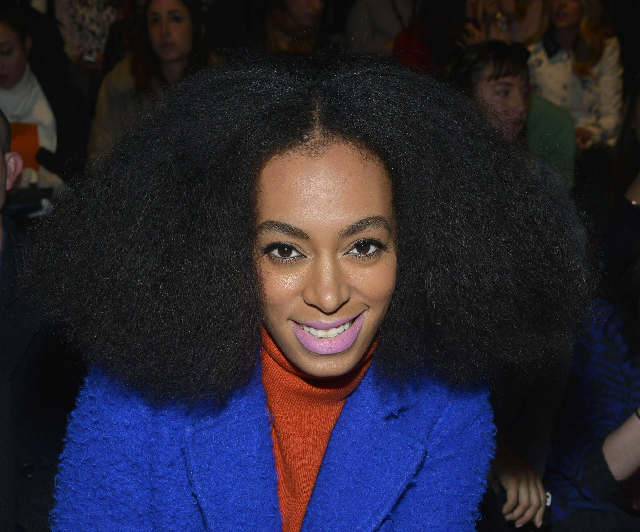 Solange Pairs Big Hair With Bold Lips
