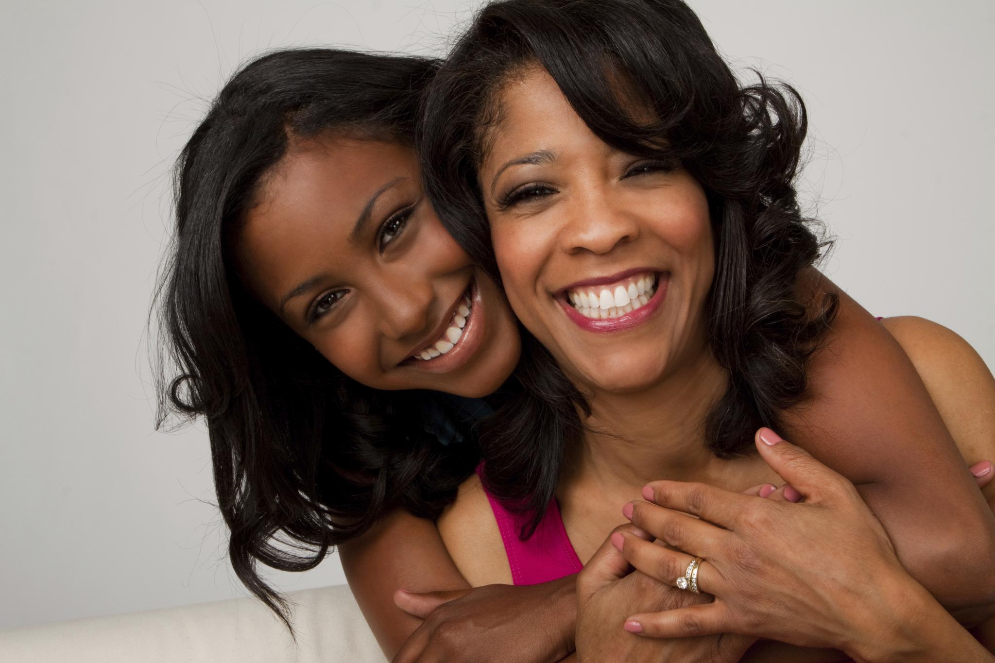 ESSENCE Editors Reveal Favorite Hair Lessons Learned From Their Mothers