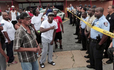 St. Louis Community Reacts to Fatal Police Shooting of Unarmed Teen, Michael Brown