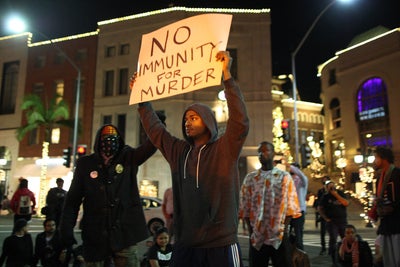 PHOTOS: Unrest Sweeps America After Michael Brown Grand Jury Decision