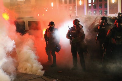 PHOTOS: Unrest Sweeps America After Michael Brown Grand Jury Decision