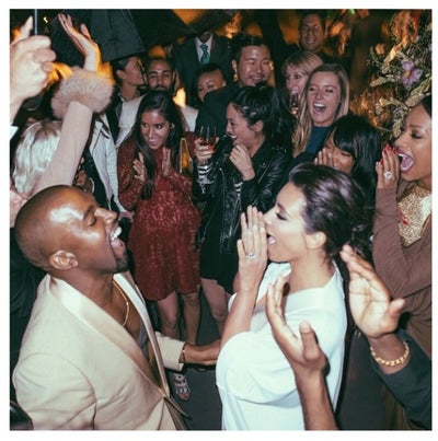 Photo Fab: Kim and Kanye Celebrate One Year Anniversary with Throwback Wedding Pics