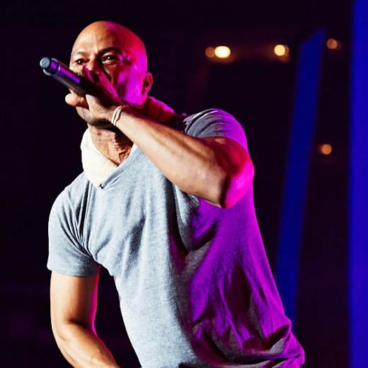Common Freestyles to a Fan on Stage at Essence Fest