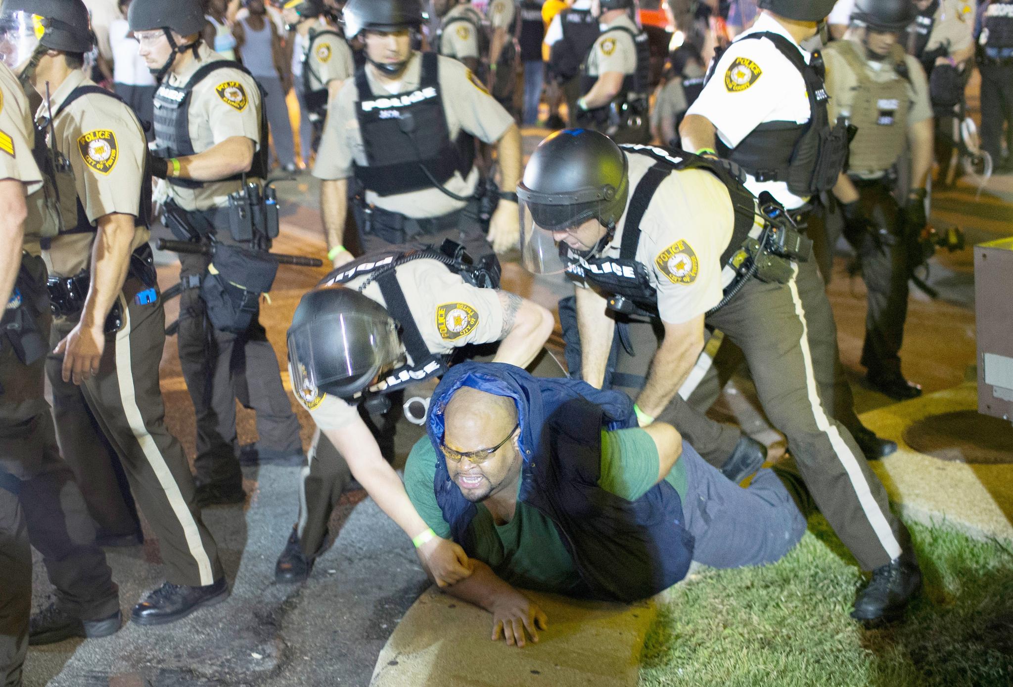 PHOTOS: 30 of the Most Captivating Images from This Week's Turbulence in Ferguson