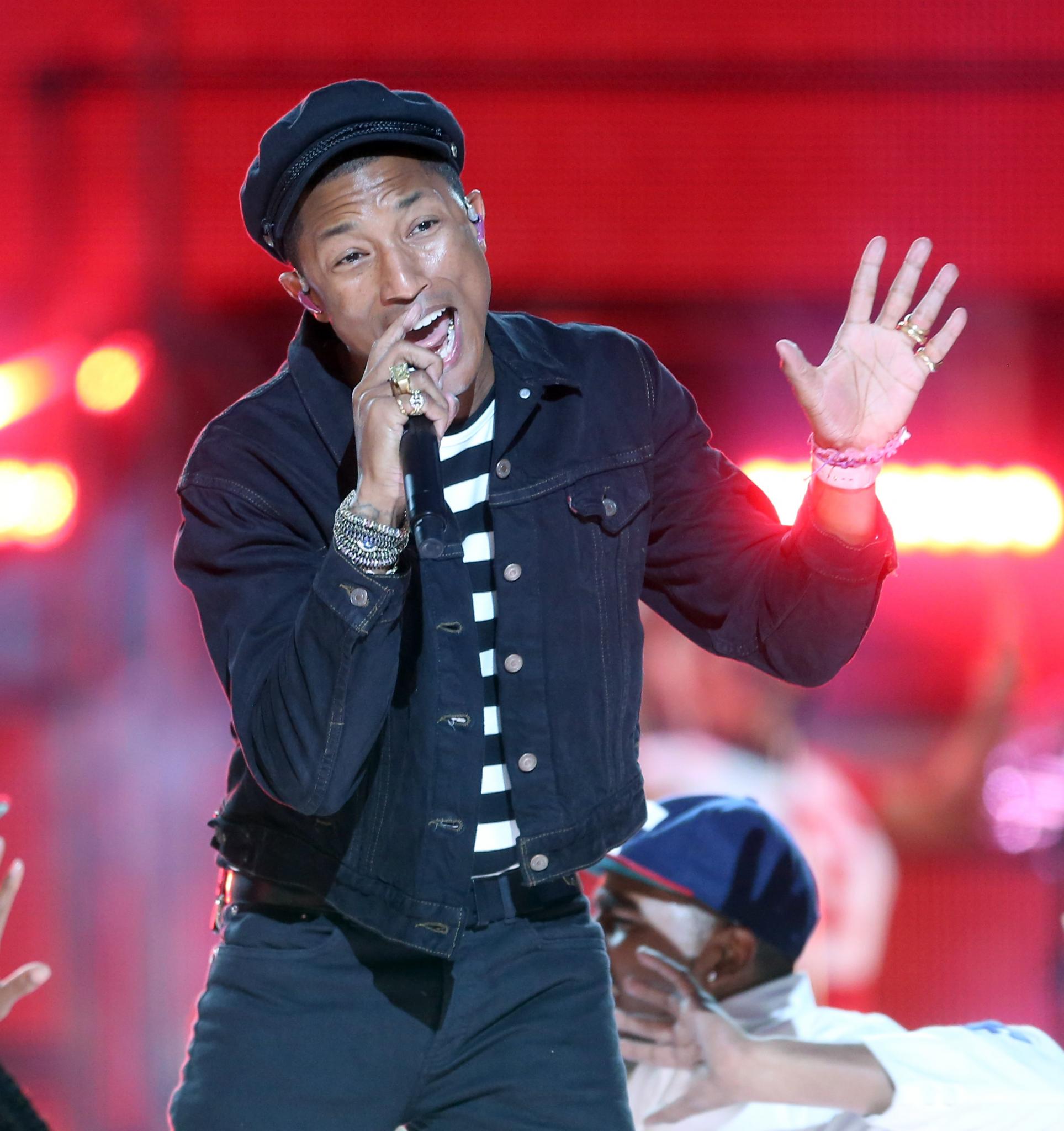 #ReadHappy: Pharrell Gives 50,000 Books to Children in Need