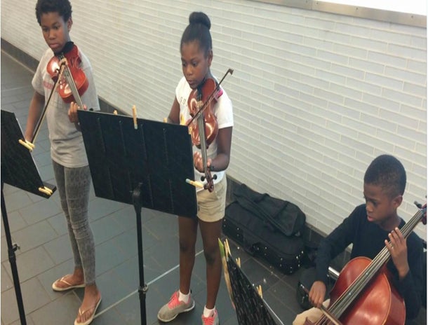 Watch Three Young Siblings Play Classical Music to Raise Money for the Homeless
