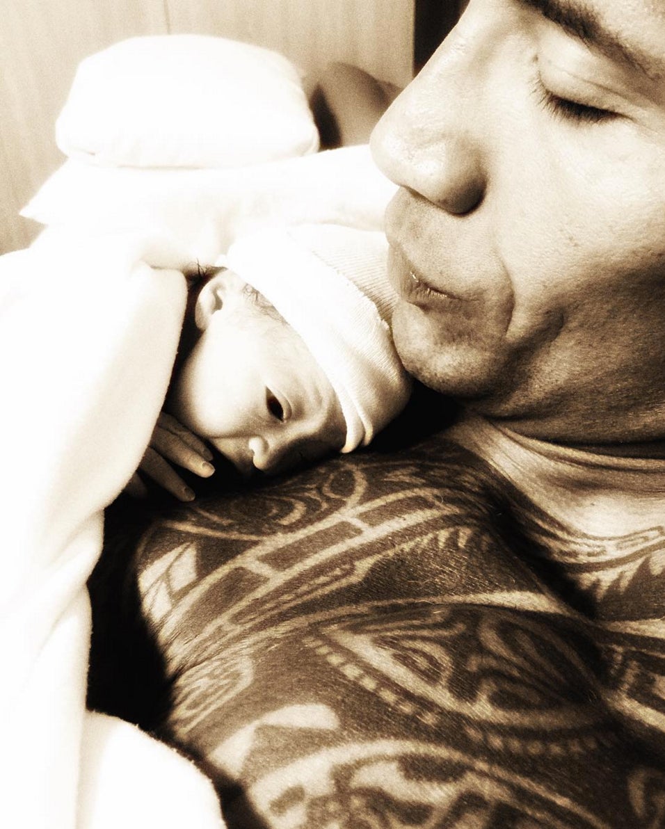 Dwayne Johnson Cuddles With Newborn Daughter and Gives Us All the Feels
