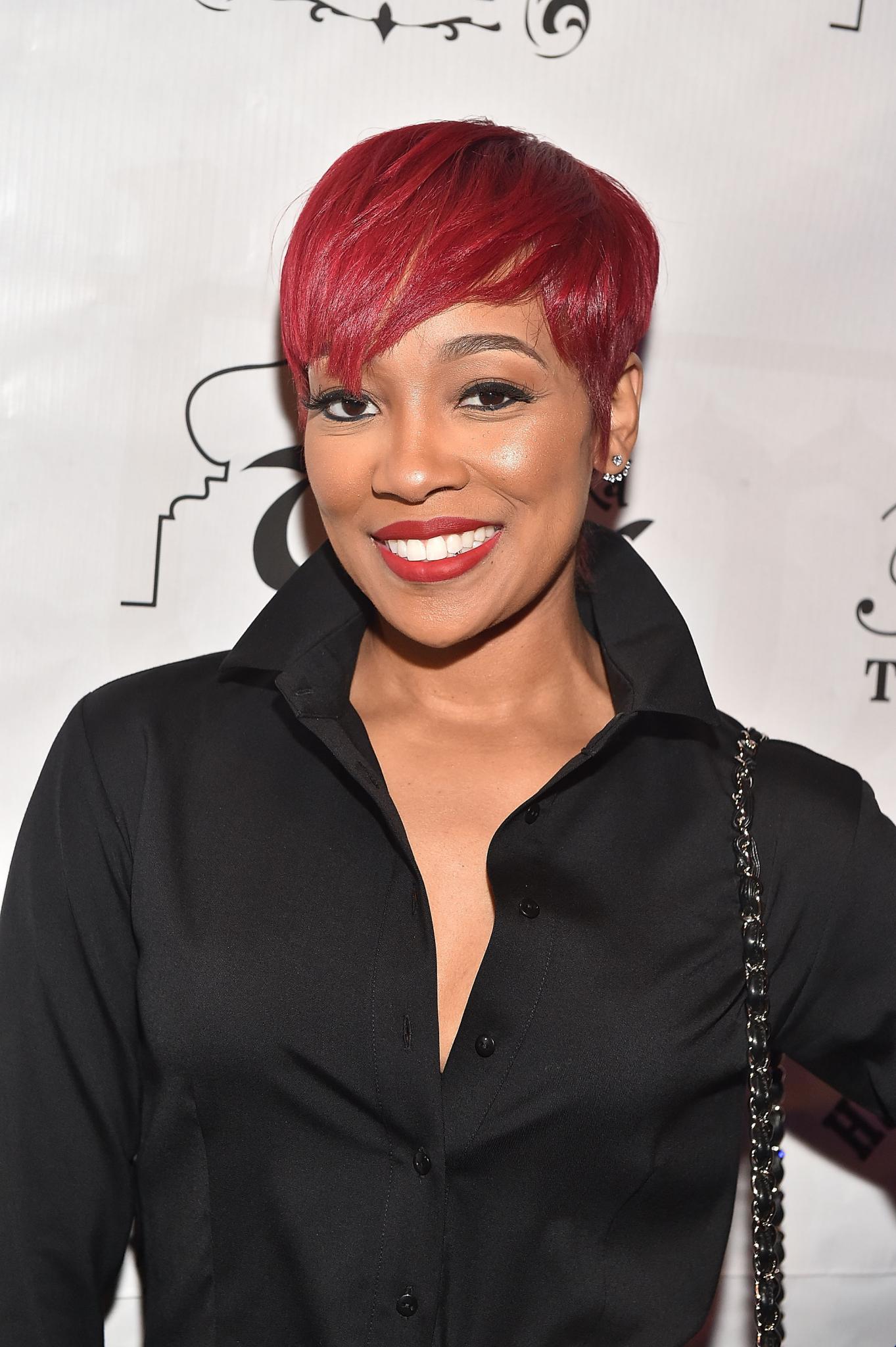 Spotlight on This Short Brush Cut Hairstyle With Intense Red Hair Color