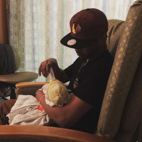 This Photo of T.I. Feeding His Newborn Daughter Will Give You All the Feels