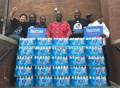 Black Men for Bernie Distribute Water to Newark Schools