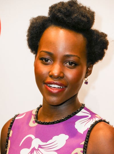 Lupita Nyong’o’s Parted Puffs Might Be Your Go-To Summer Style