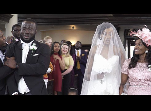 One Groom Had the Sweetest Reaction to His Bride Walking Down the Aisle
