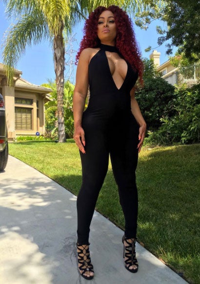 Blac Chyna is Making Motherhood Chic With Soft Red Curls And a Black Catsuit
