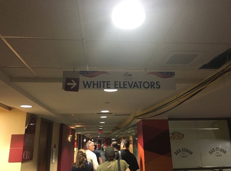 ‘White Elevator’ Sign Sparks Controversy at Republican National Convention Arena
