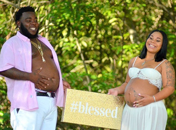 Couple Rocks His and Her Baby 'Bumps' In Viral Maternity Shoot
