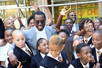 Family Man Diddy Opens New Charter School in Harlem, Celebrates With Students