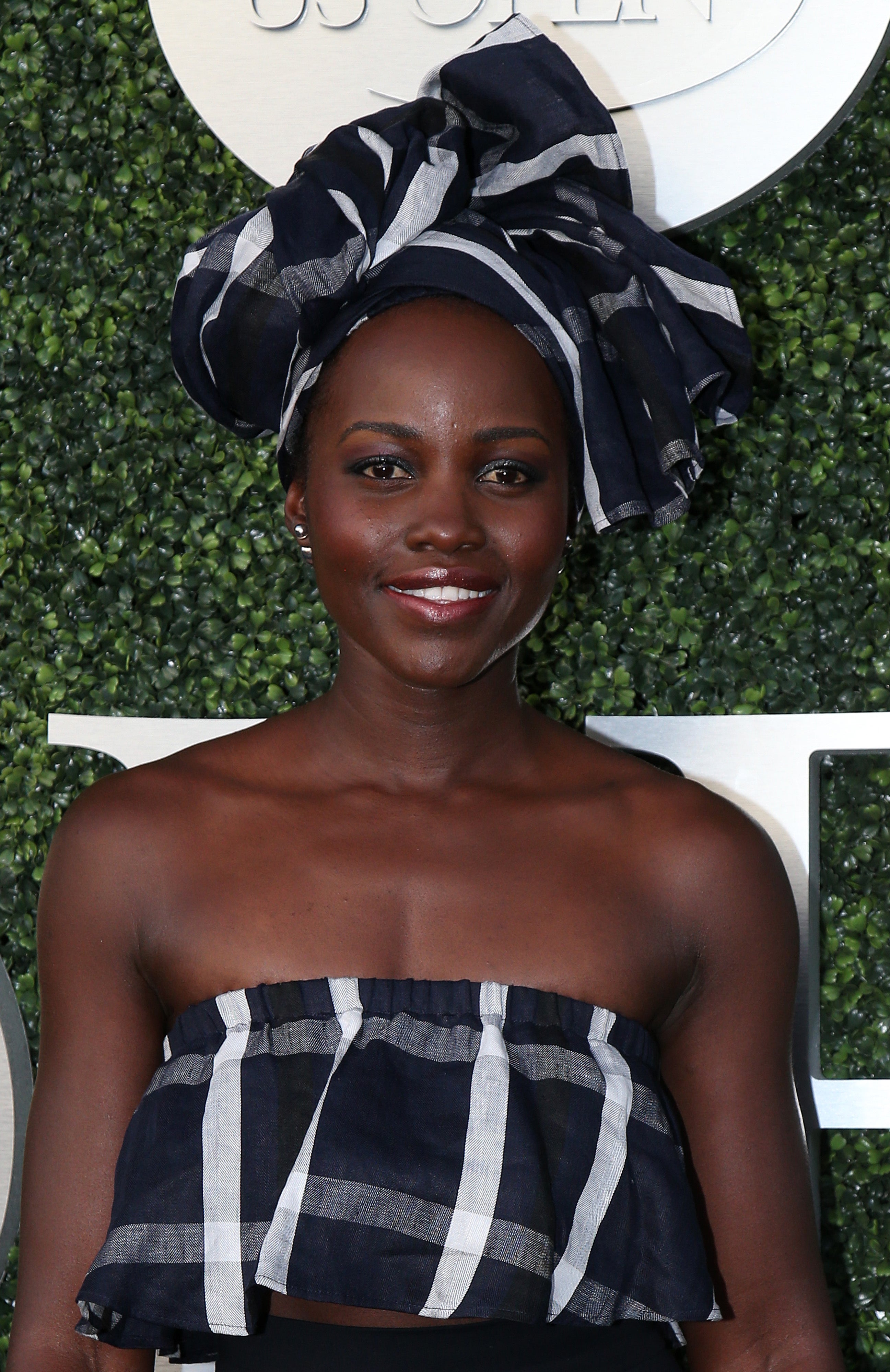 Lupita Nyong'o Slays in Adorable Printed Top and Headwrap
