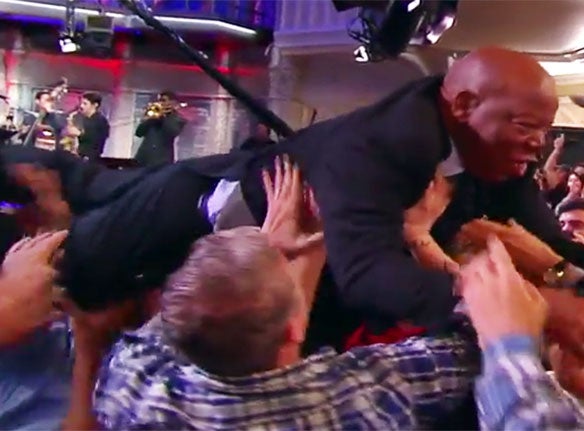 You Have To Watch Iconic Civil Rights Leader John Lewis Crowd Surf On 'Colbert Show'
