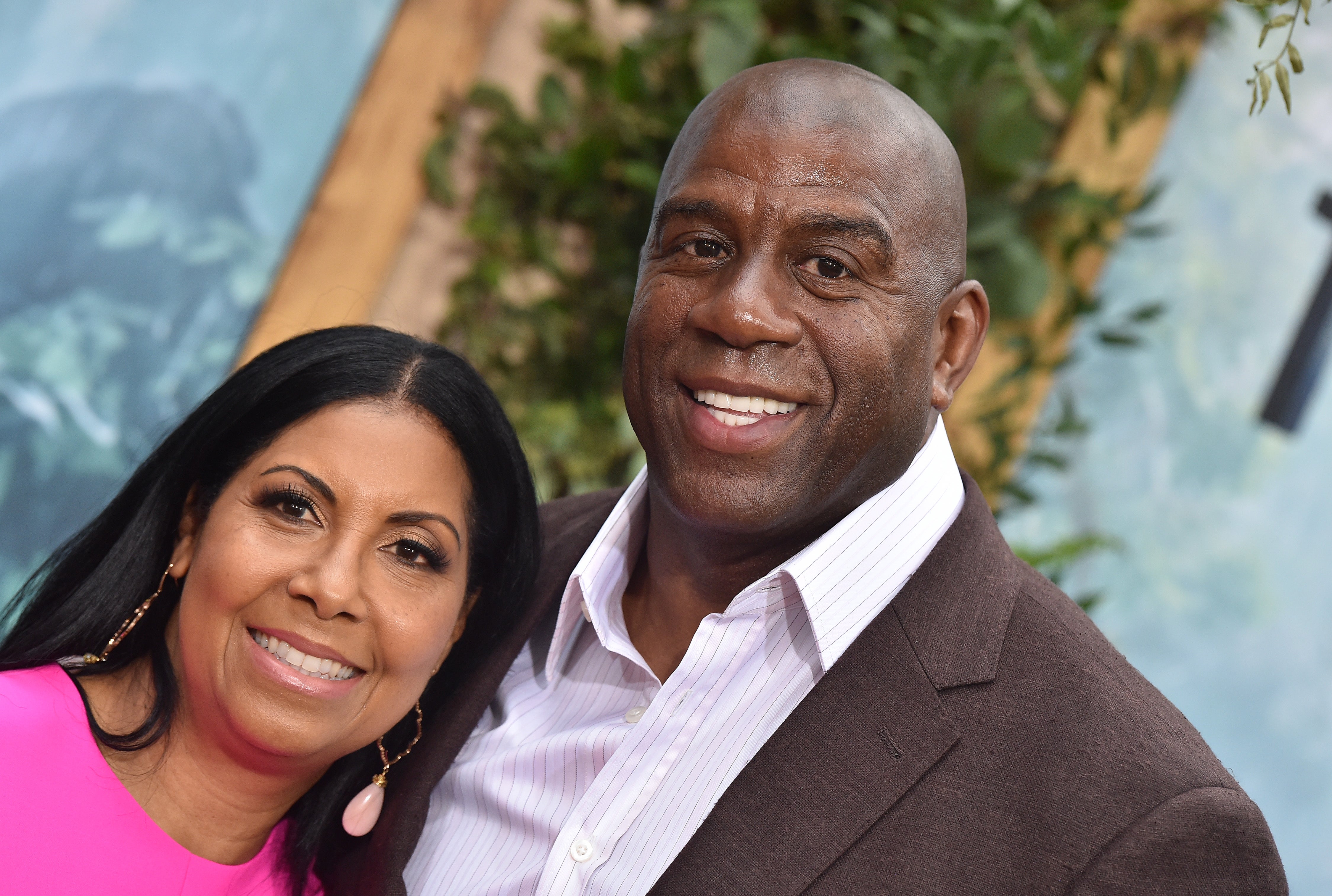 Magic Johnson and Wife Cookie Celebrate pic
