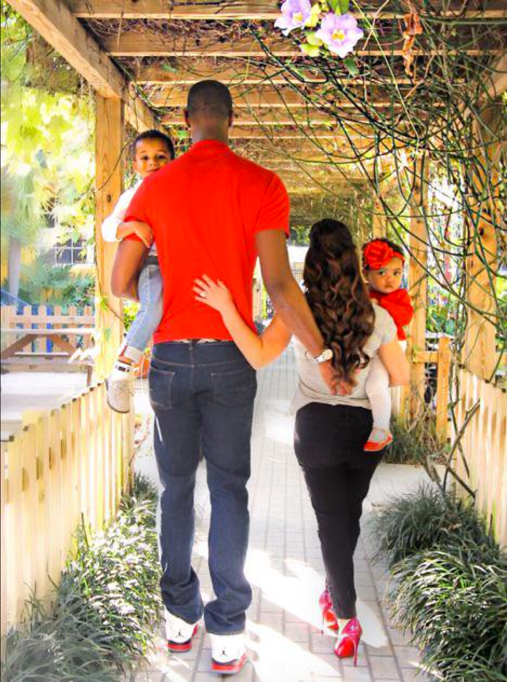 All Of Chris and Adrienne Bosh's Cutest Family Moments
