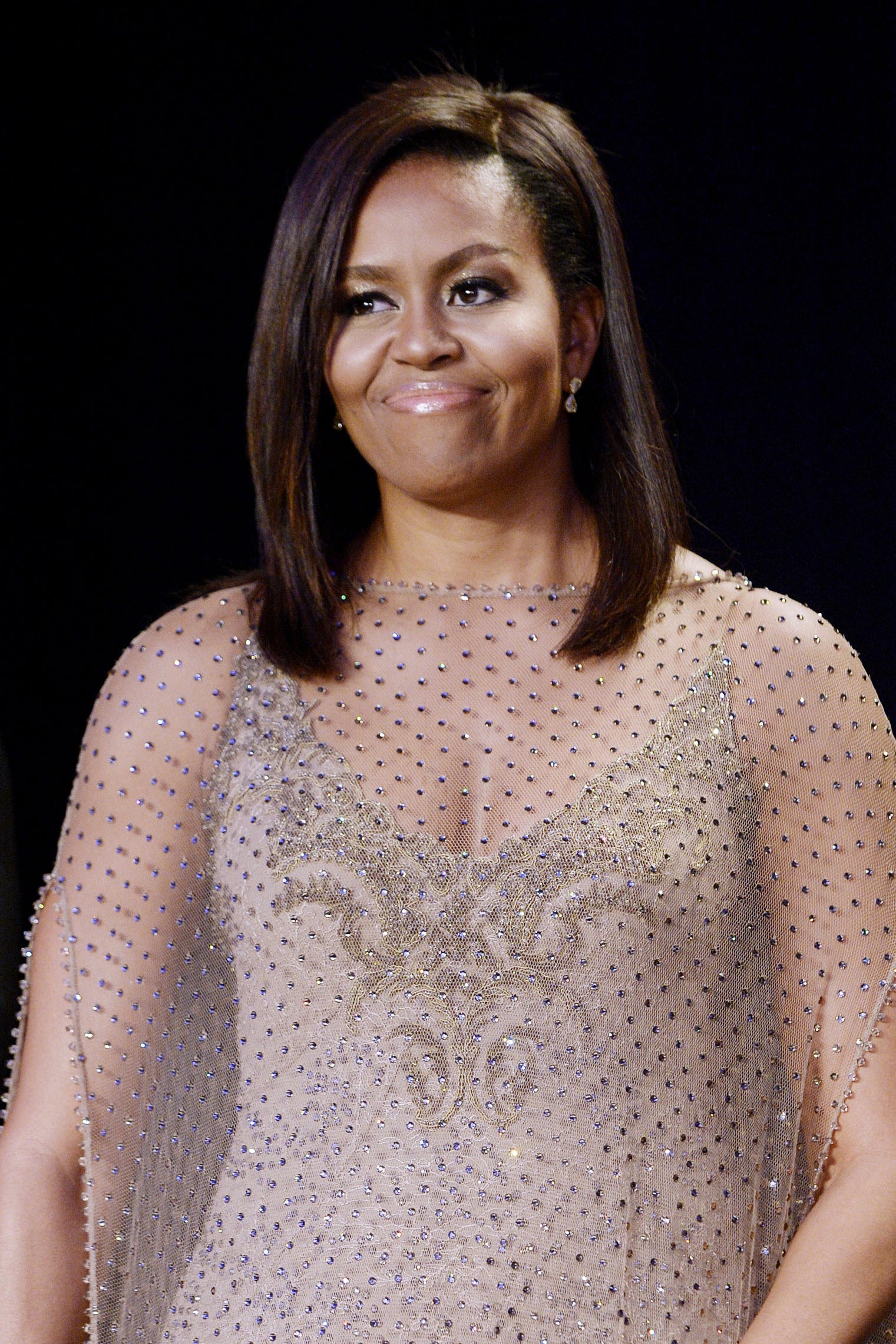 A Look Back At All Of Michelle Obama's Best Hair Moments In The White House

