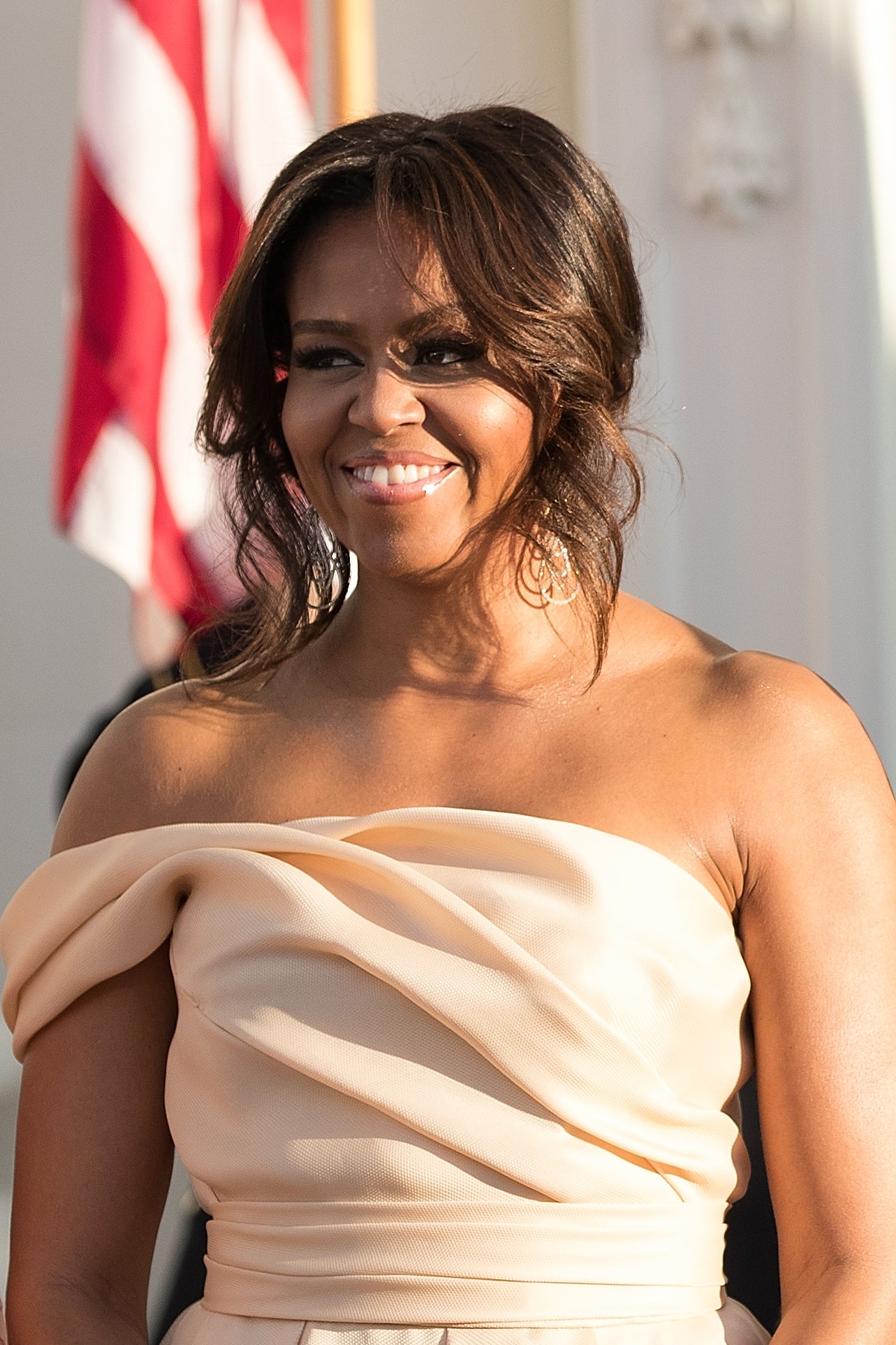 A Look Back At All Of Michelle Obama's Best Hair Moments In The White House
