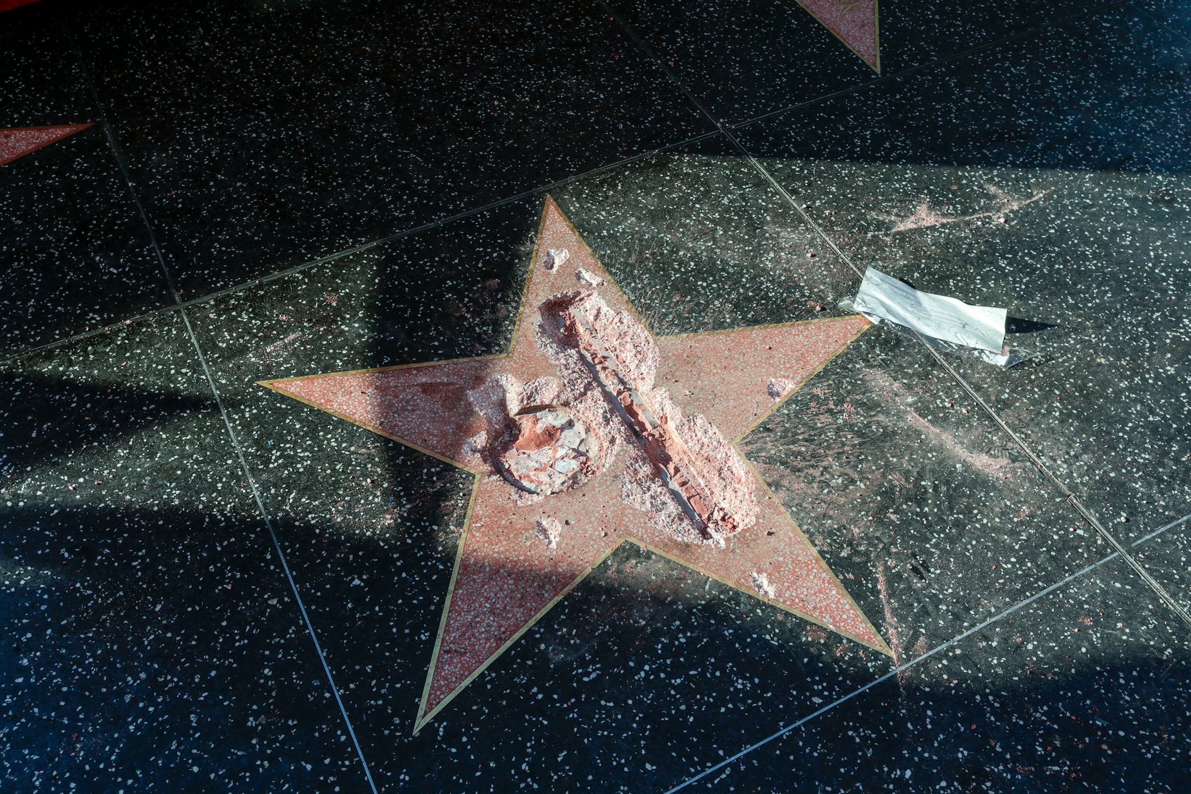 Someone Completely Destroyed Donald Trump's Walk Of Fame Star 
