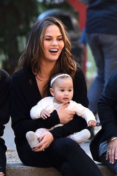 Chrissy Teigen and Daughter Luna’s First Family Portrait with Santa Includes a Stand-In John Legend