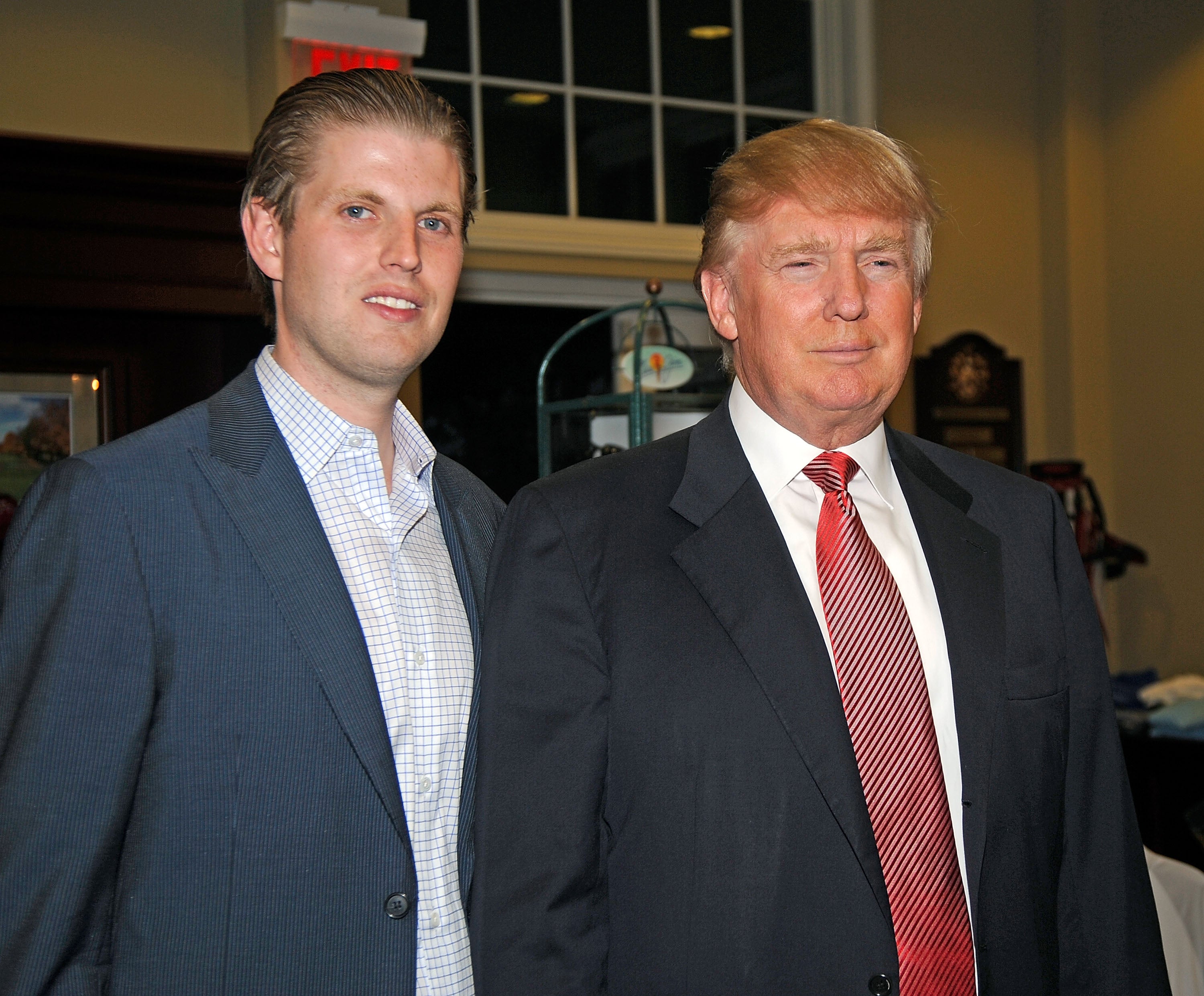 Donald & Eric Trump Couldn’t Help But Check Out Their Wives’ Ballots At The Polls
