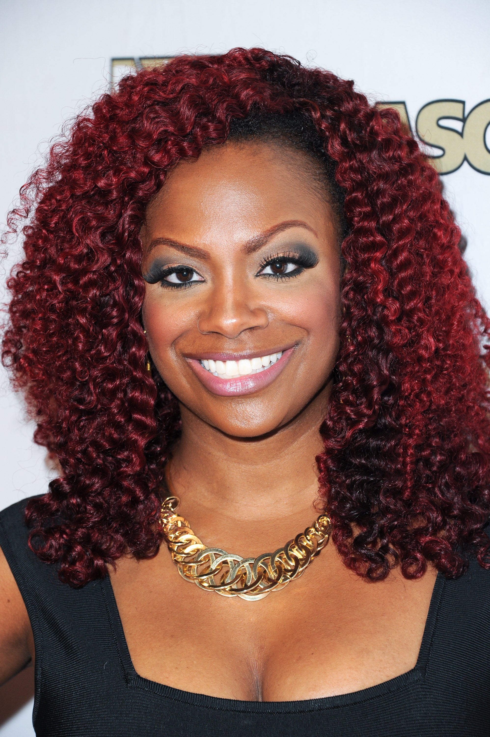 15 Red Hot Celebrity Hair Moments We'll Never Forget
