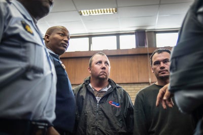 Two White South Africans Arrested After Forcing Black Man Into Coffin