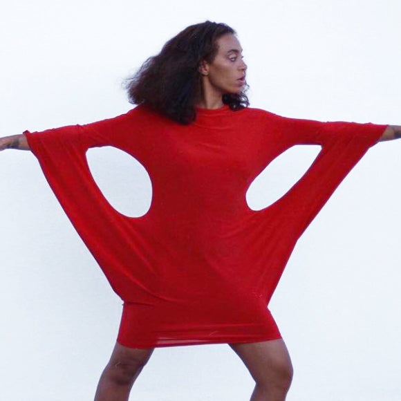 Solange Wows In Red Jumpsuit Designed By Her Mom Tina Lawson During 'Tonight Show' Performance
