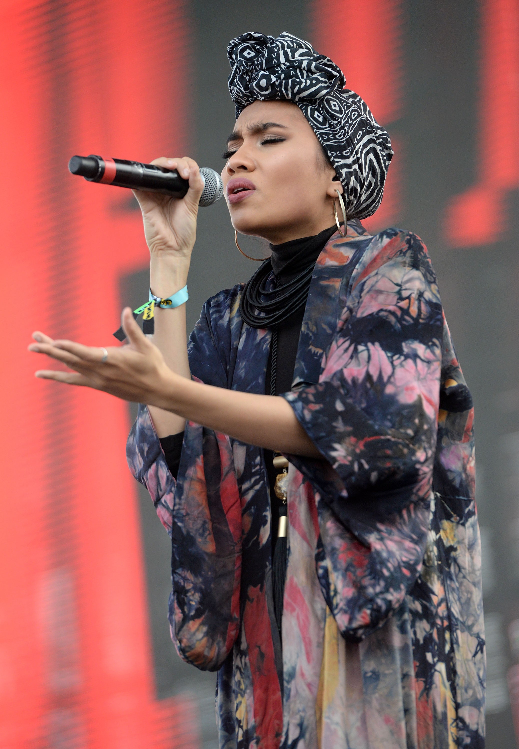 ESSENCE Festival Performer Yuna Tackles Love’s Greatest Challenge In New Video For “Unrequited Love”