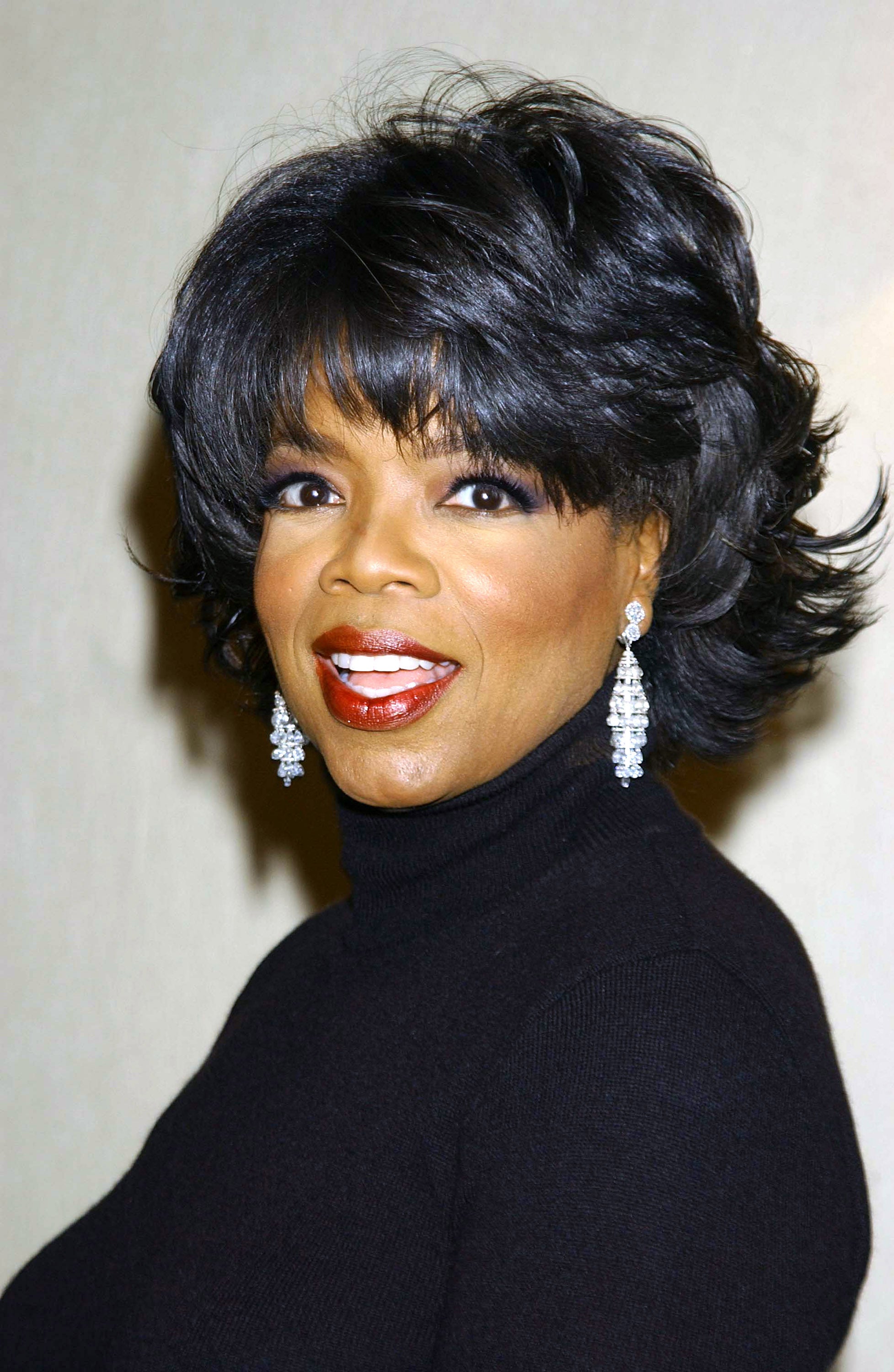 A Look Back At Oprah Winfrey's Legendary Hair Journey 
