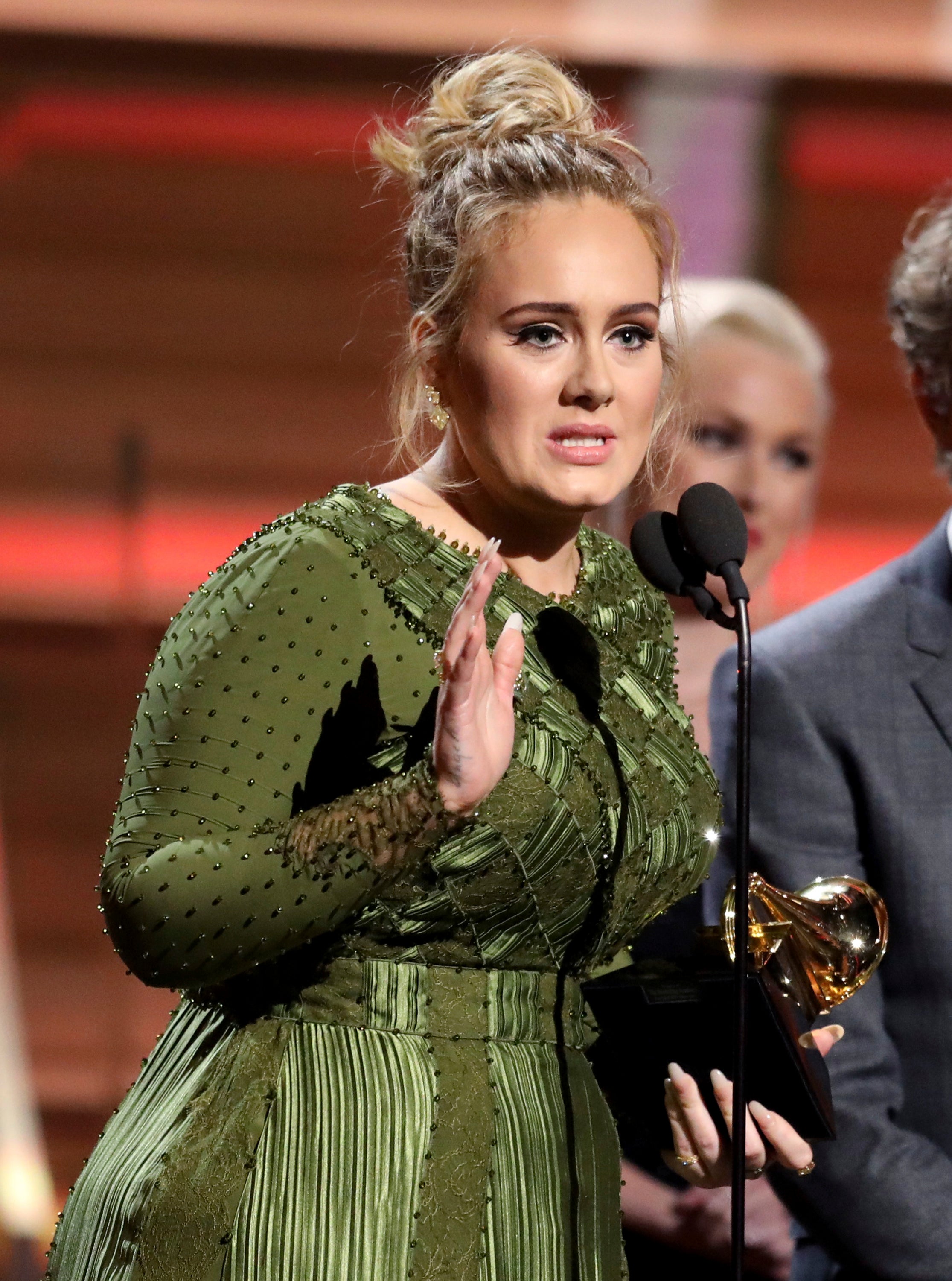 Adele Breaks Her Grammy For Album Of The Year In Half