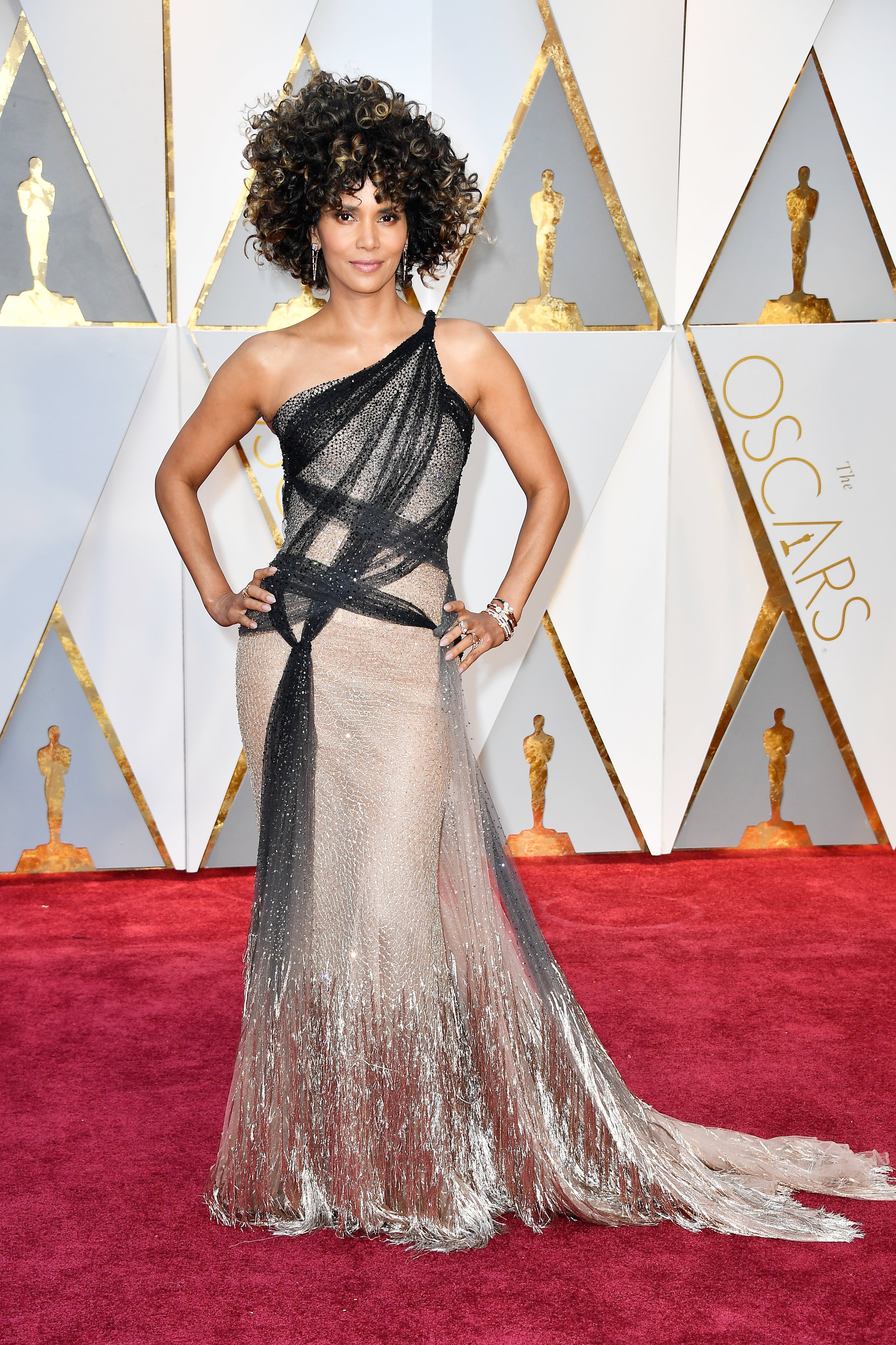 Halle Berry Defends Her Oscar Curls: 'I Celebrate My Natural Hair'
