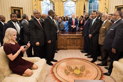 Kellyanne Conway Gets Dragged for Sitting On Oval Office Couch Like a Child