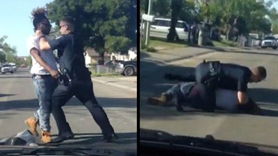 Police Officer Caught On Video Tackling and Punching Alleged Jaywalker