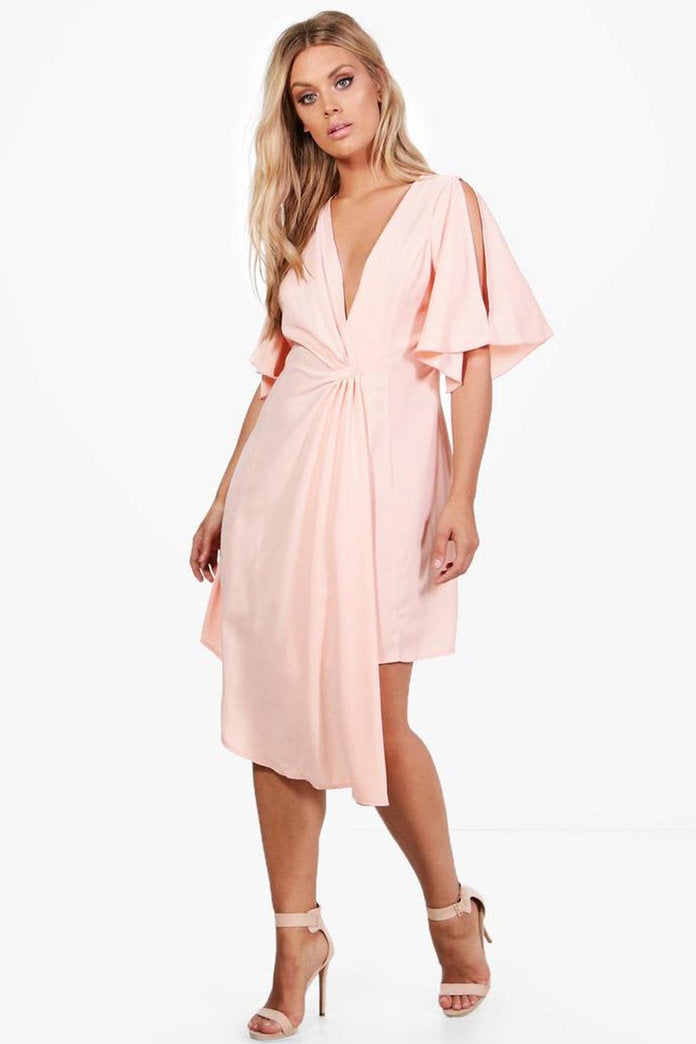  11 Dresses to Complement Your Curves at a Warm-Weather Wedding
