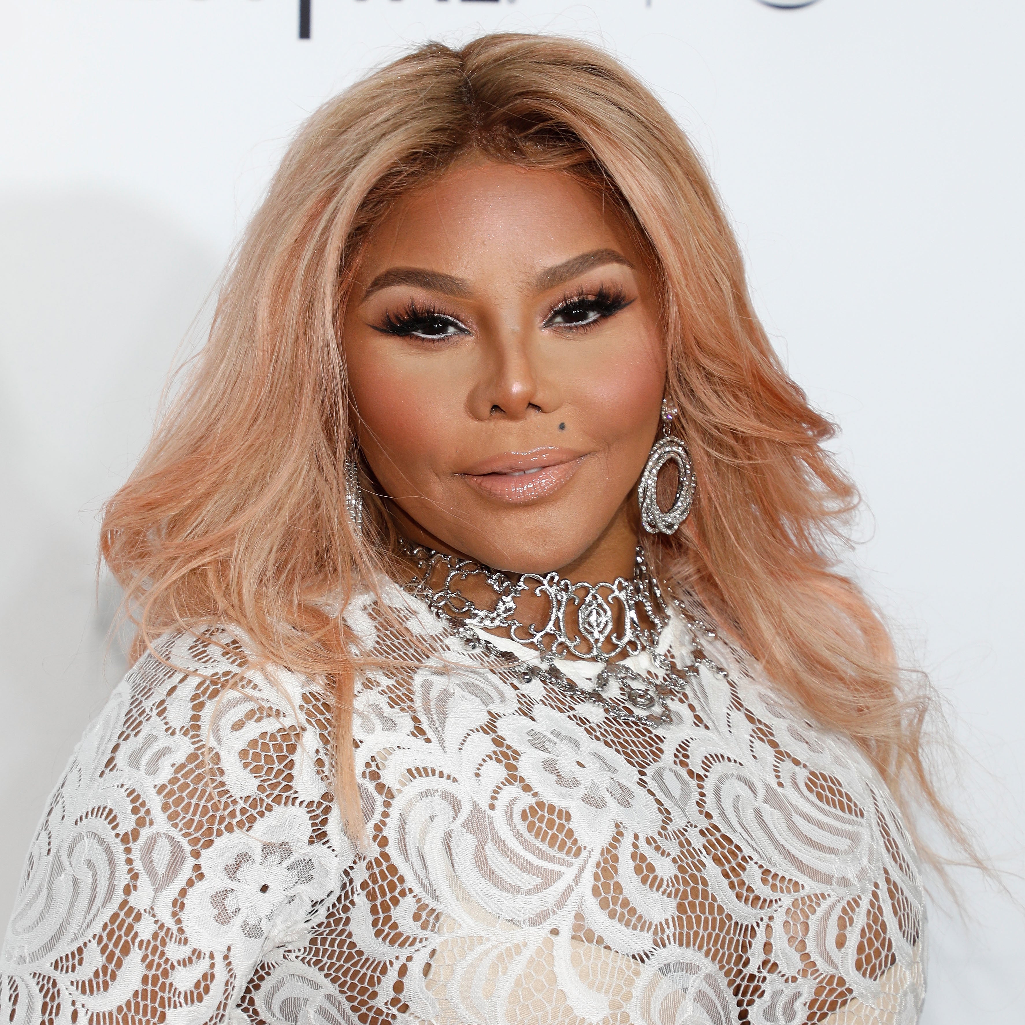 Lil' Kim: Then and Now
