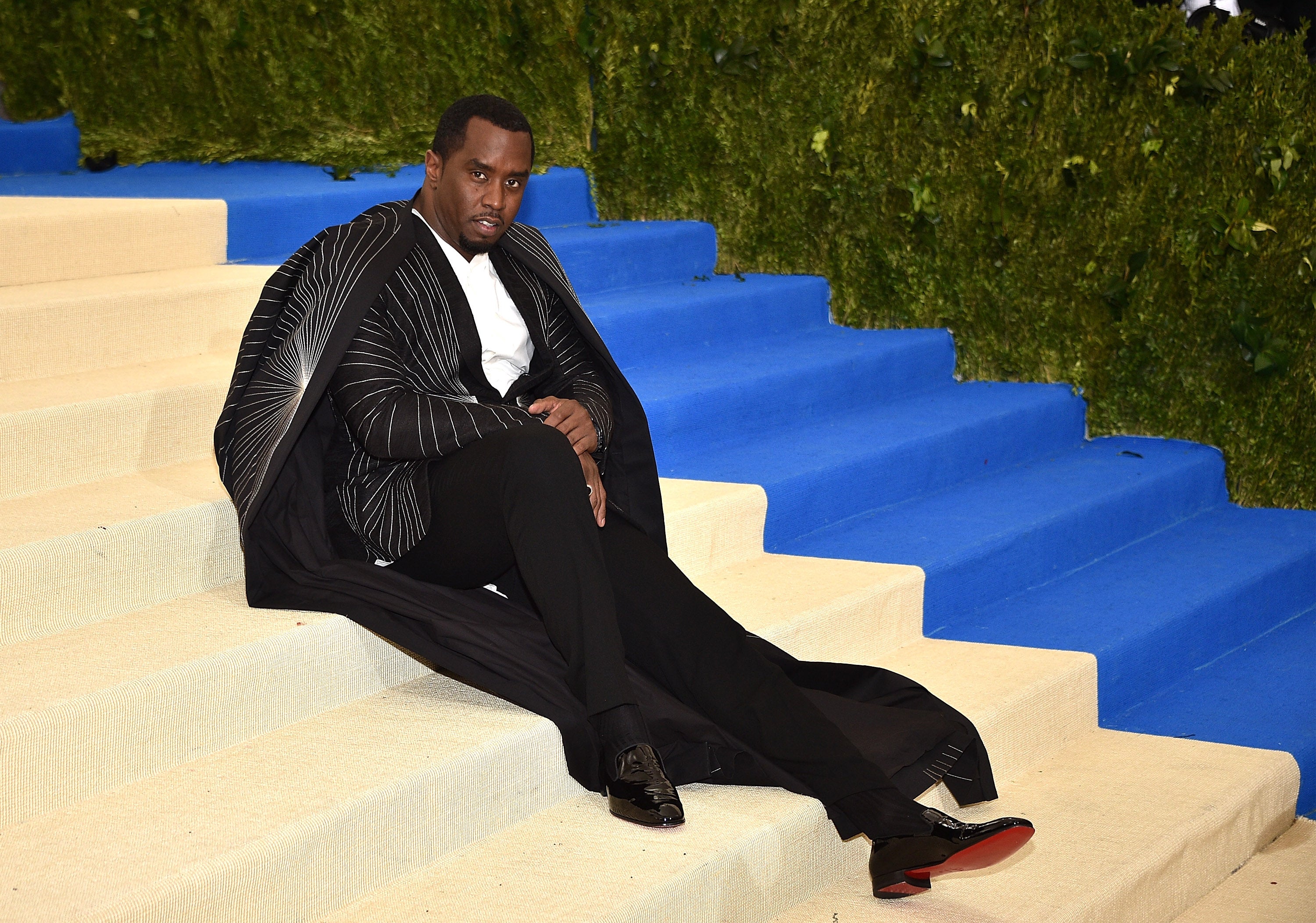 Diddy Served Some Very Fierce Poses On The Met Gala Carpet
