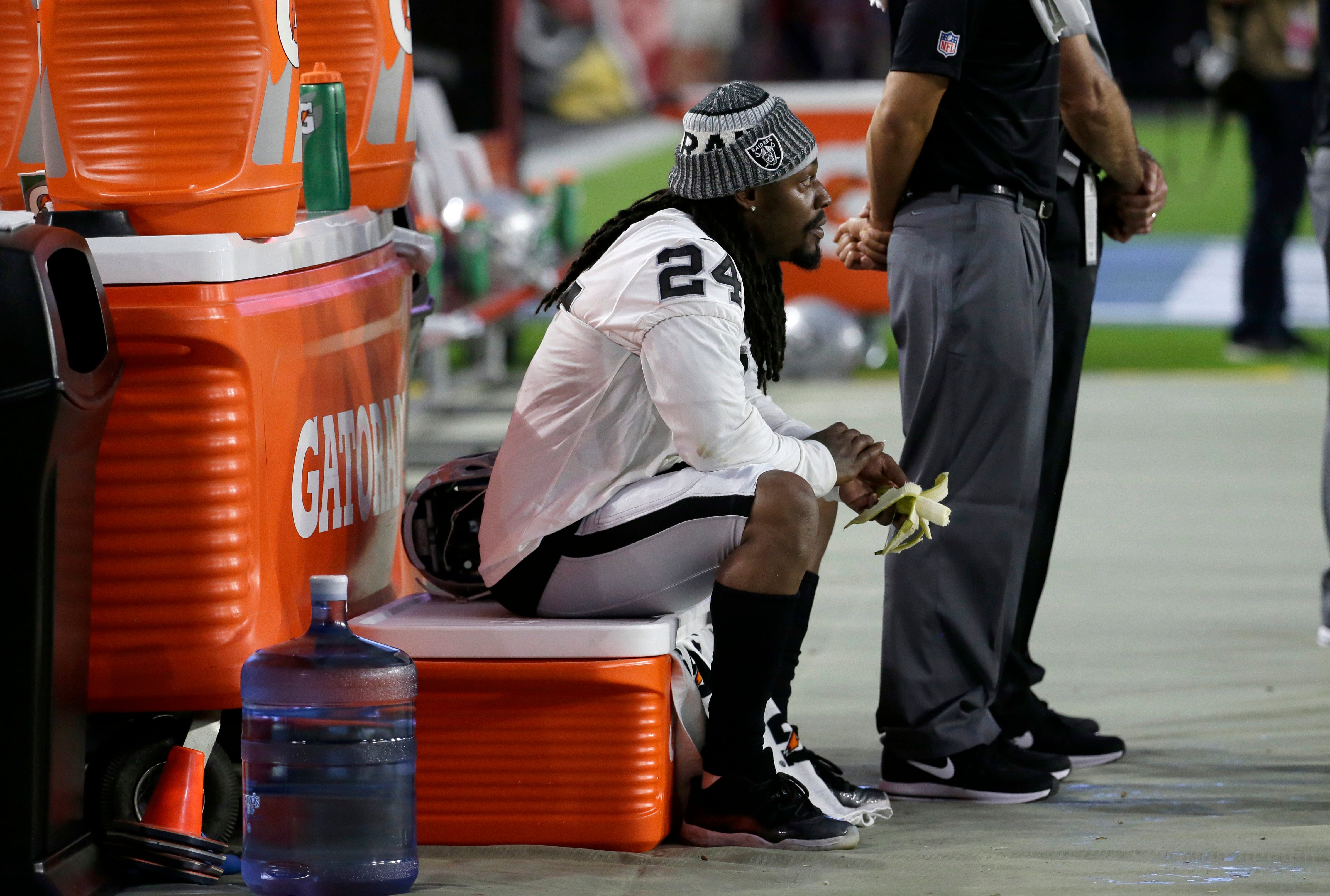 Marshawn Lynch Remains Seated During National Anthem  
