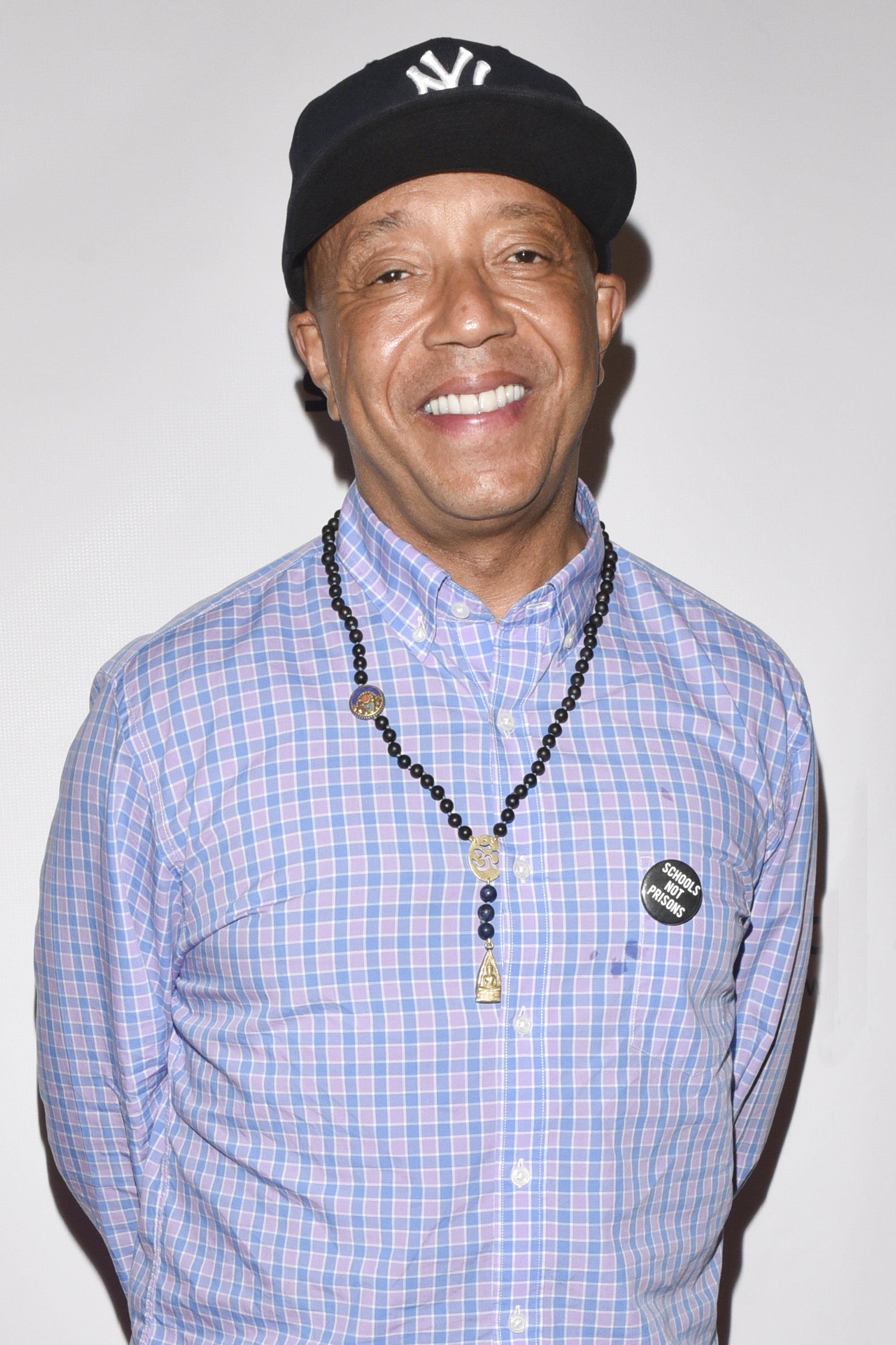 Russell Simmons Accuser Recalls Being 'Pinned Down' And Raped By Media Mogul

