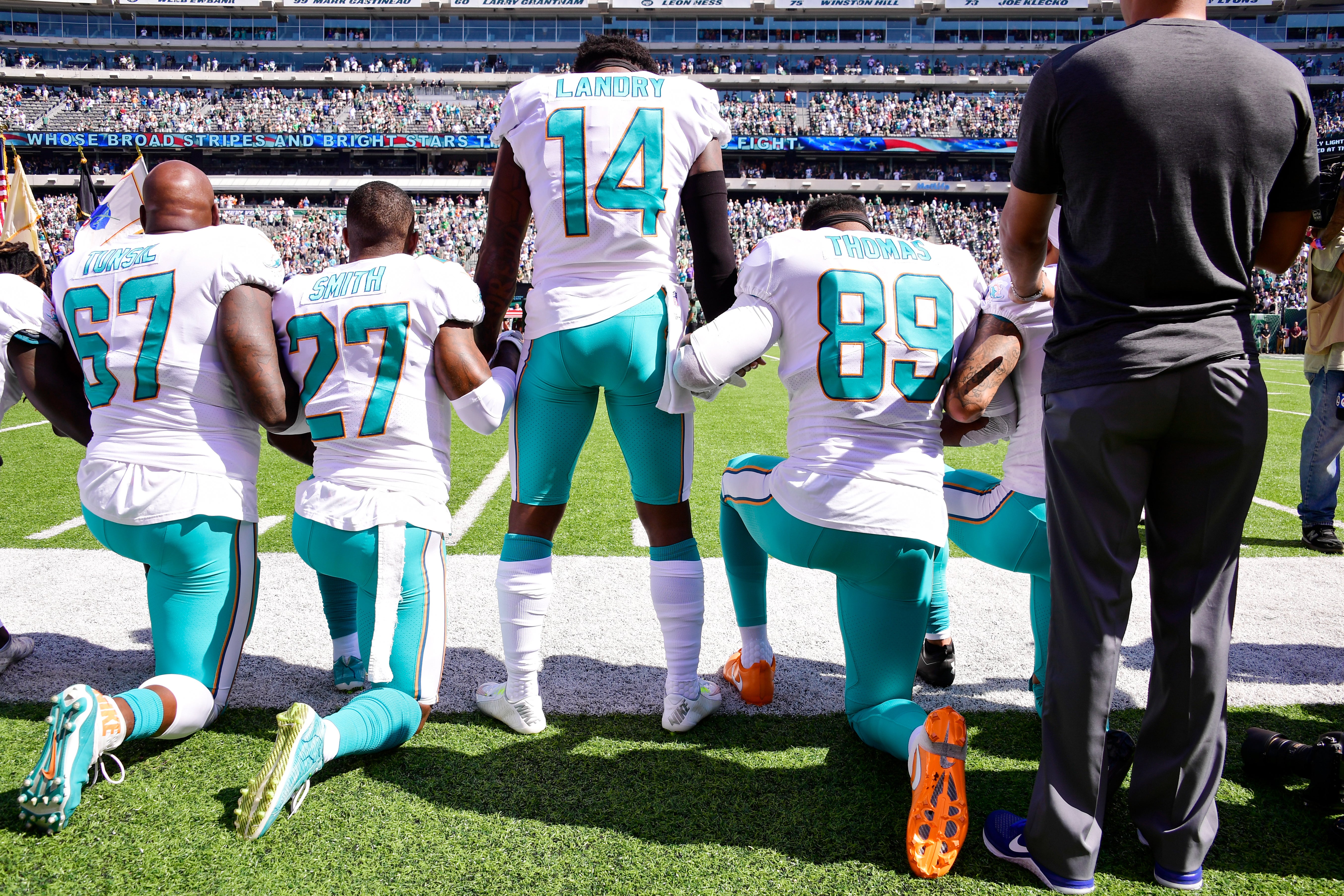 #TakeAKnee: Celebs And NFL Stars React To Trump's Latest Criticism Of National Anthem Protests
