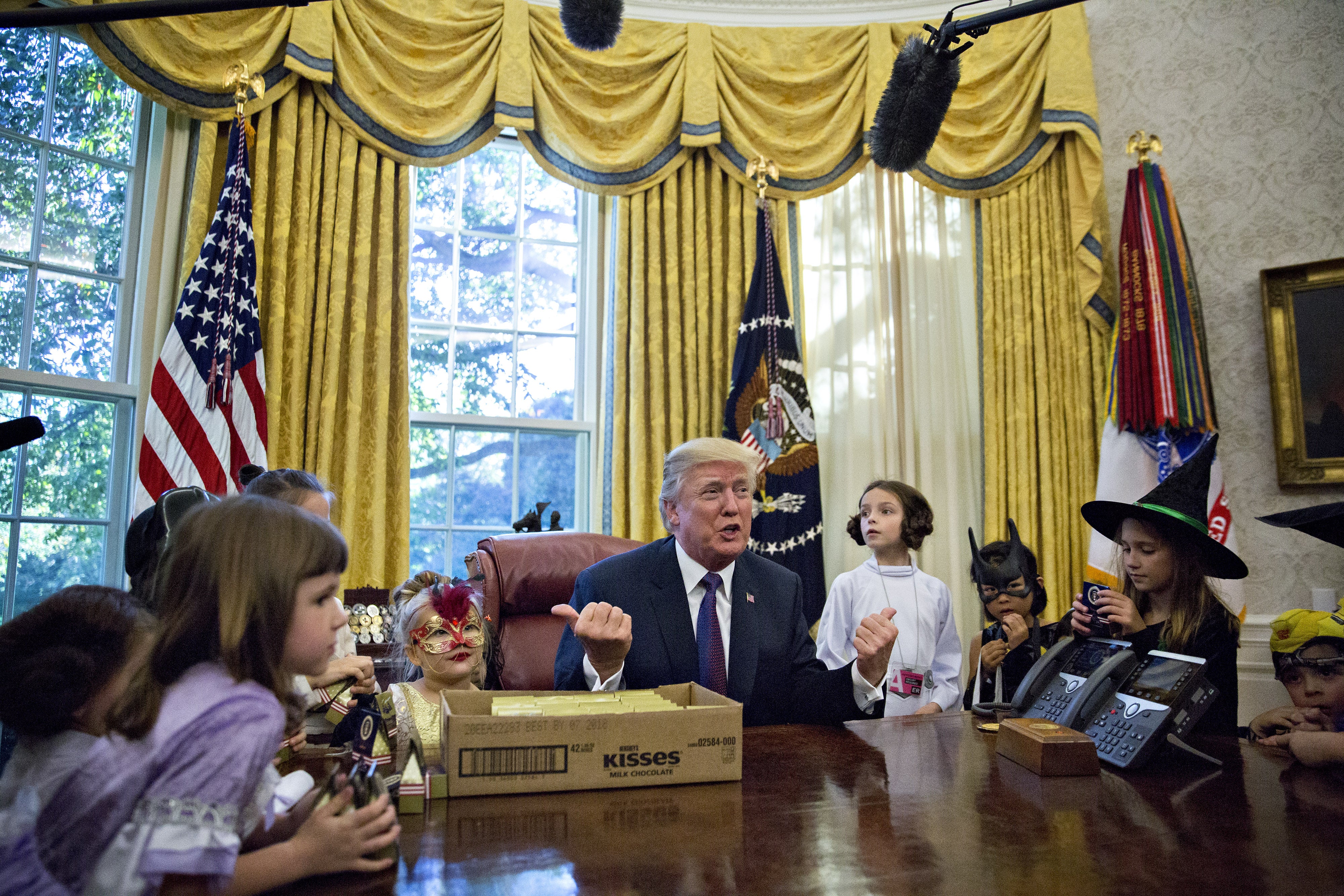 'You Have No Weight Problems, That's the Good News.' President Trump Gives Candy to Children
 

