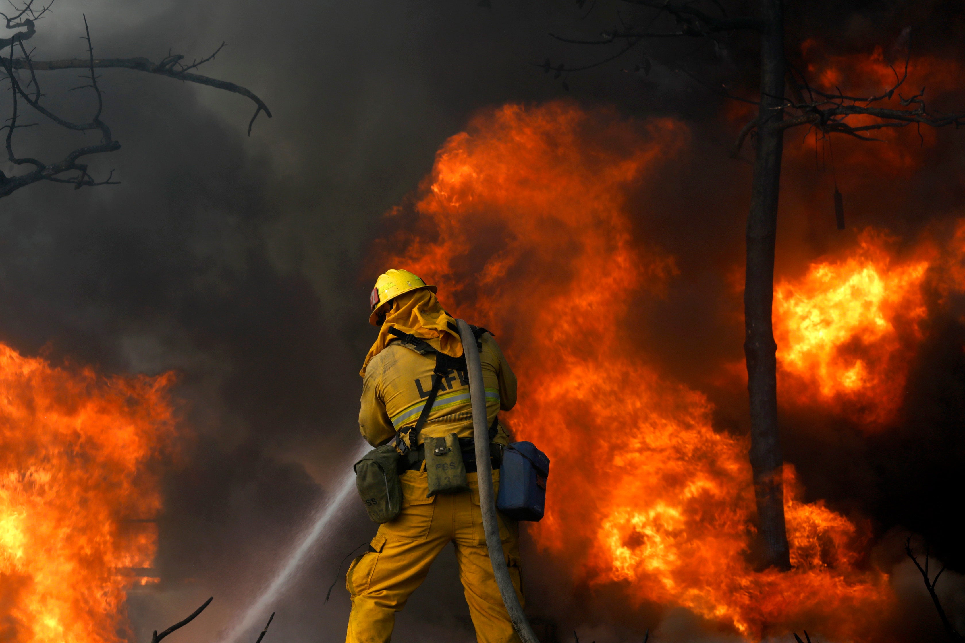 Wildfire Erupts In Bel-Air As Flames Consume Parts Of Southern California